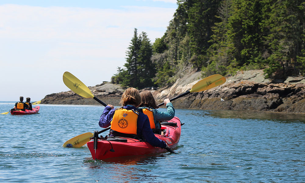 Kids in tandem kayak on Maine Kayaking trip