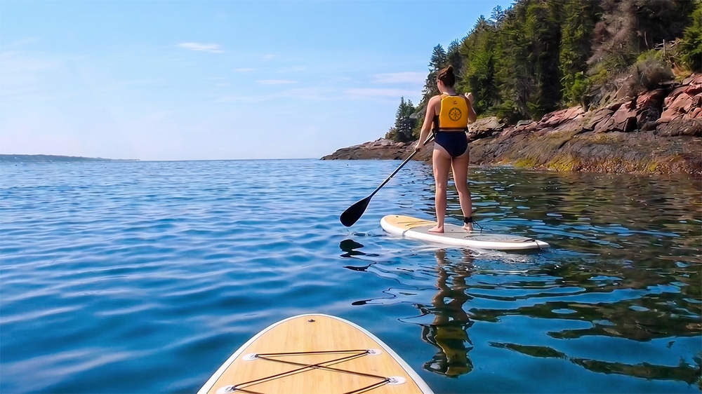 Stand-up paddleboard (SUP) rental in Maine — available at our Boothbay Harbor and Pemaquid shops